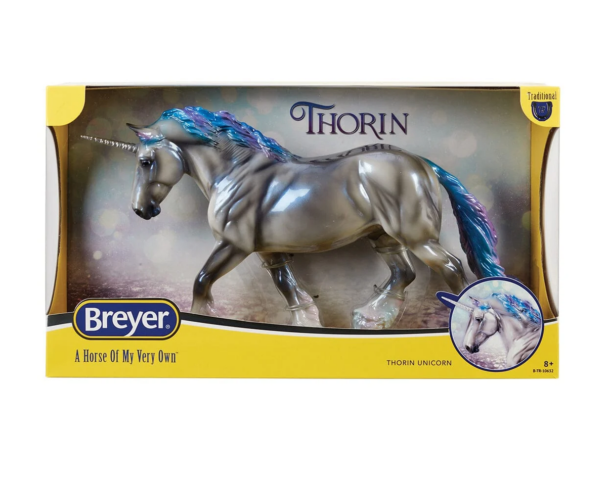 Model unicorn, silver-gray coat with blue and purple accents, shown in box - Thorin