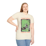 Woman wearing off white t-shirt with a graphic of a green dragon and text 'Today's Mood: Chaotic Tired'