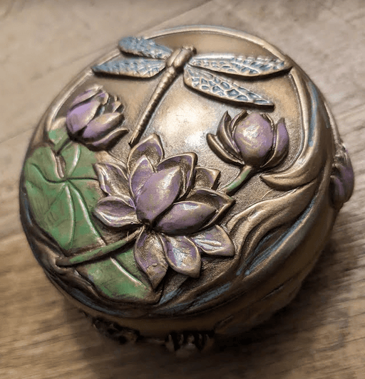 Trinket box with dragonfly and lilies on the lid