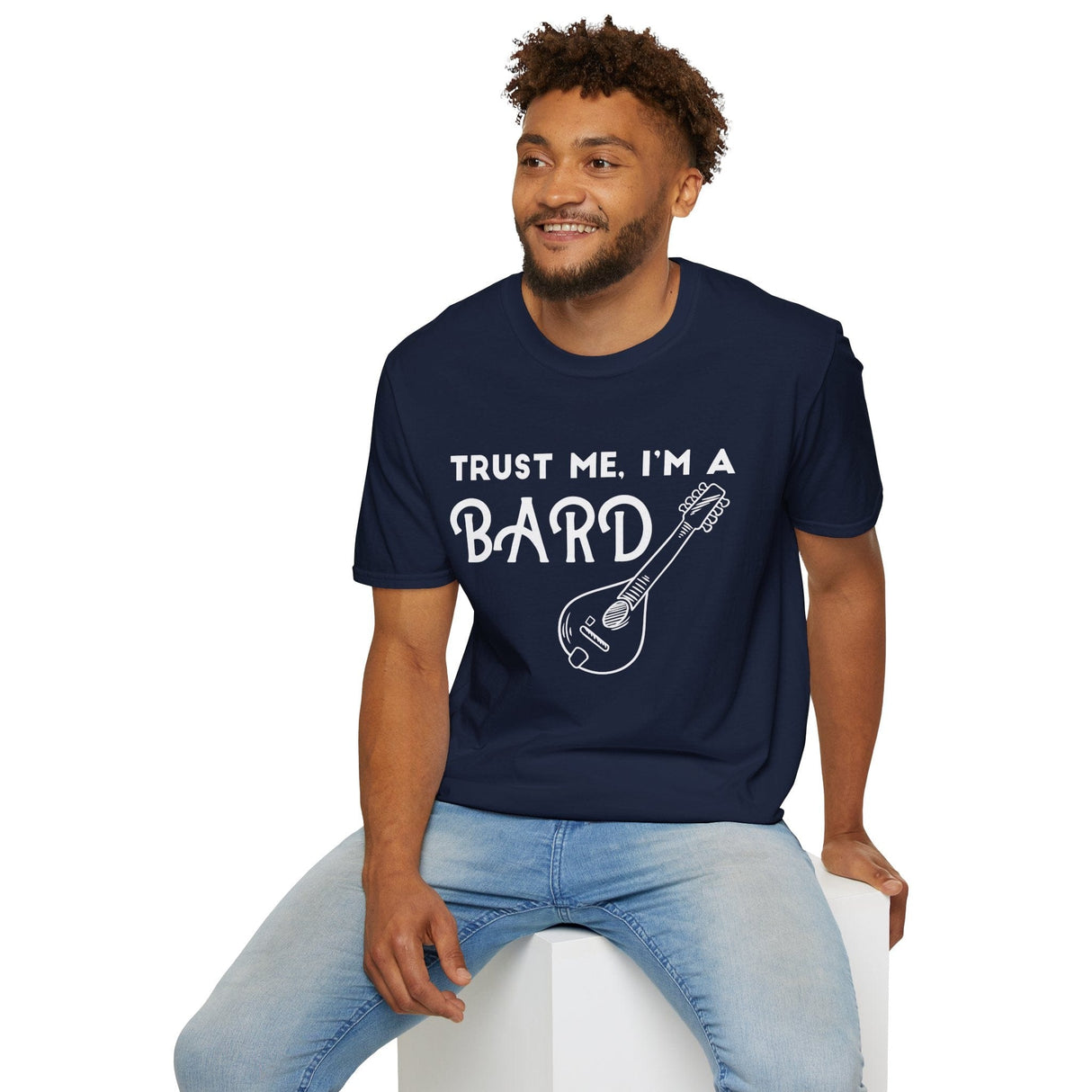 Man wearing dark blue  t-shirt with 'Trust Me, I'm a Bard' text and mandolin graphic