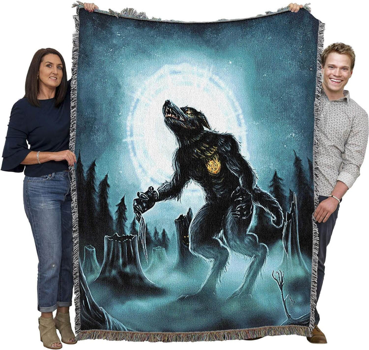 Full moon werewolf blanket being held by two adults to show large size