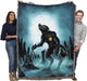 Full moon werewolf blanket being held by two adults to show large size