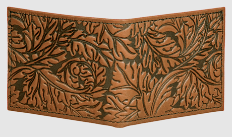 Leather wallet with overall design of acanthus leaves, shown in saddle brown/tan