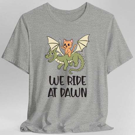 Gray t-shirt with a cat riding a dragon graphic and 'We Ride at Dawn' text