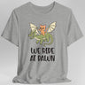 Gray t-shirt with a cat riding a dragon graphic and 'We Ride at Dawn' text