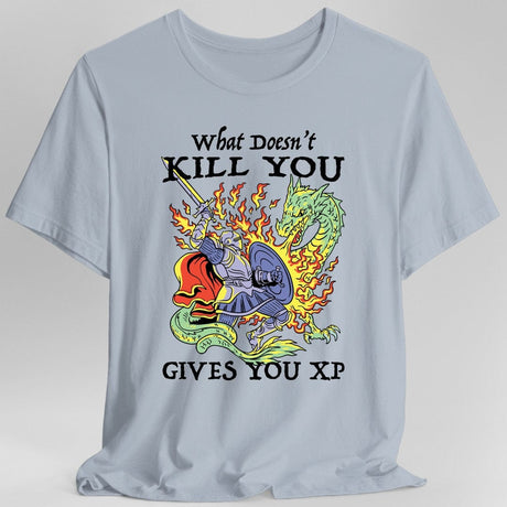 Light Blue  t-shirt with a graphic design of knight fighting a dragon and text reading "What Doesn't Kill You Gives You XP"