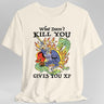 Natural/off white t-shirt with a graphic design of knight fighting a dragon and text reading "What Doesn't Kill You Gives You XP"