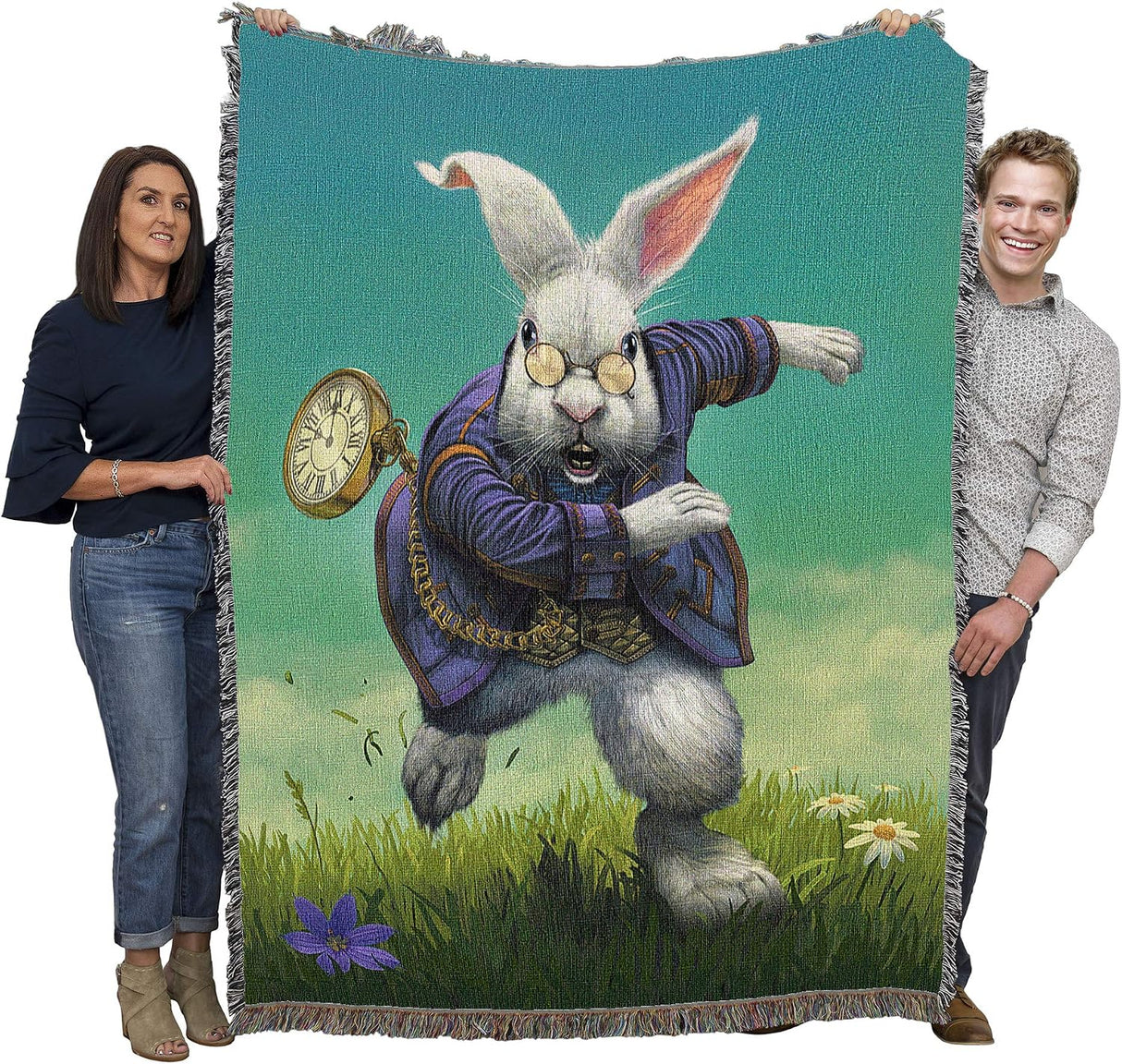 Tapestry blanket featuring the White Rabbit with pocketwatch from Alice in Wonderland, held by two adults
