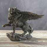 Winged and horned lion figurine in faux-bronze