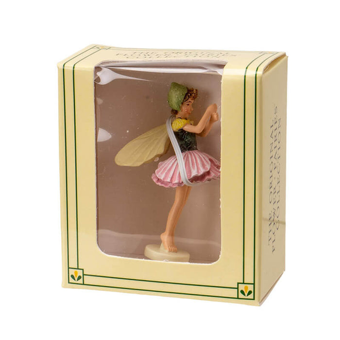 Cicely Mary Barker Flower Fairy Figurine dressed in a poppy blossom of pink and green with pale yellow wings. Shown in box
