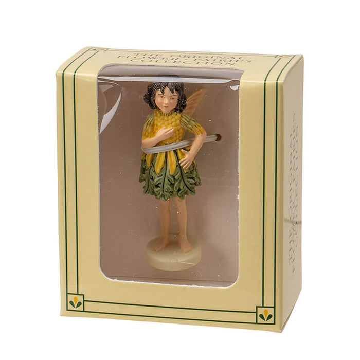 Cicely Mary Barker Flower Fairy Figurine - yellow and green ragwort dress with dark brown hair. Shown in box