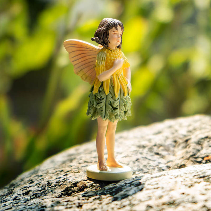 Cicely Mary Barker Flower Fairy Figurine - yellow and green ragwort dress with dark brown hair