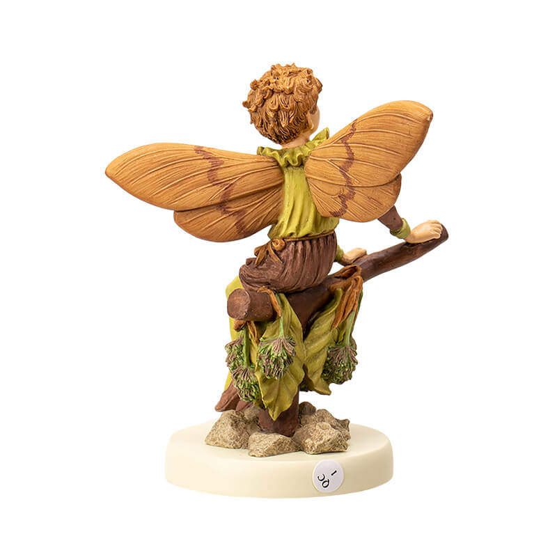 Flower Fairy figurine - Beech Tree Fairy written on base, pixie boy in pale green and brown/tan with short hair sitting on a branch