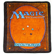 MtG fleece throw shaped like a Magic the Gathering card. It has the logo and "Deckmaster" as well as the elemental circles to look like the cardback. 