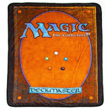MtG fleece throw shaped like a Magic the Gathering card. It has the logo and "Deckmaster" as well as the elemental circles to look like the cardback. 