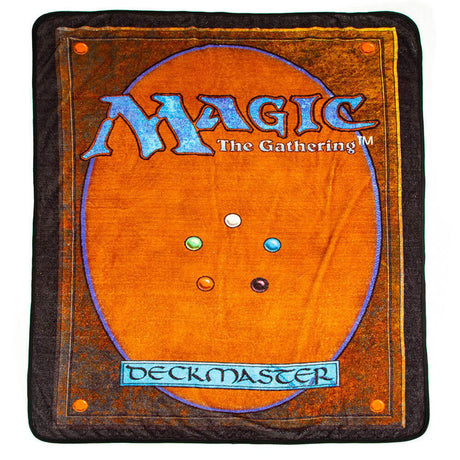 MtG fleece throw shaped like a Magic the Gathering card. It has the logo and "Deckmaster" as well as the elemental circles to look like the cardback. 