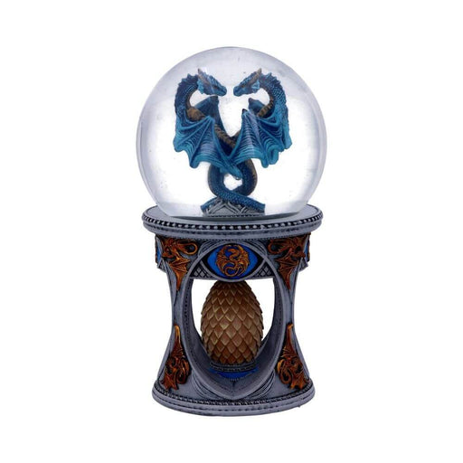 Waterglobe snowglobe with two blue dragons facing each other inside. Ornate base with golden dragon designs and a bronze dragon egg at the center