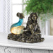 Mermaid lamp shown illuminating a space in a home on a shelf