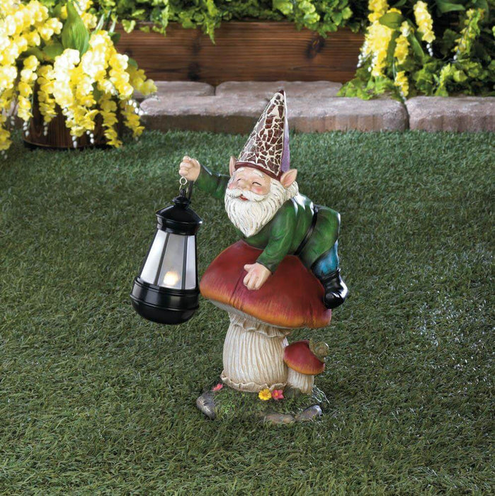 Garden gnome laying on a mushroom holding a glowing lantern, sitting in a yard with yellow flowers