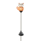 Teacup kitten solar garden stake, lit up via solar