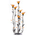 Tealight candle holder with amber colored flower blossom holders and accent flowers. Metal leaves and stems