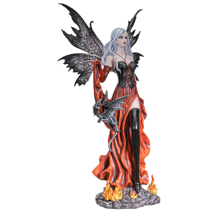 Figurine showing a fairy in a black and red dress. There are fires at her feet and a small black dragon at her hip.
