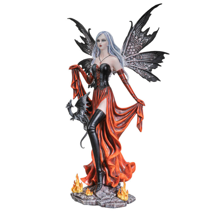 Figurine showing a fairy in a black and red dress. There are fires at her feet and a small black dragon at her hip
