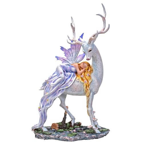 Blond fairy with a purple dress and wings sleeps on a tall white stag in the forest