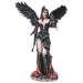 Angel fairy with black feathered wings, black dress made of feathers and ebony boots. Red contrasting accents. A wand is held in one hand and raven or crow perches on the other.