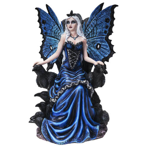 This beautiful figurine features a fairy with ornate blue butterfly wings and an indigo corset dress to match. She has pale ivory hair, which is a contrast to the black ravens who sit with her. The crows are all around, and the pixie queen rests her hands on two of them.