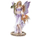 Figurine of a fairy in pale purple with butterfly wings, and two dragons - one green and one orange