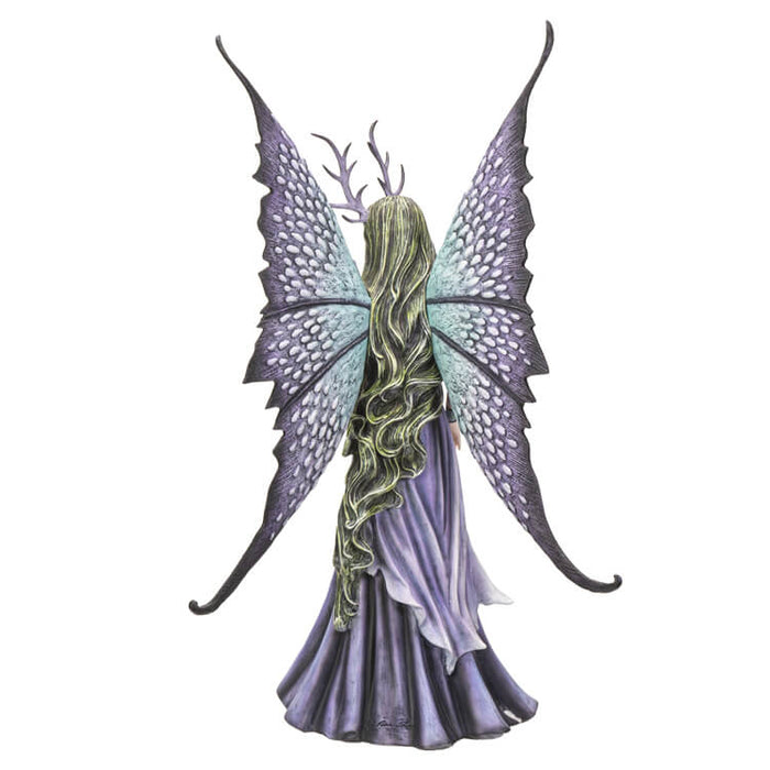 Large fairy figurine in shades of blue, purple, green and teal. Fairy has spotted wings, long hair and antlers. Shown from the back, displaying moss green hair nearly to the base.