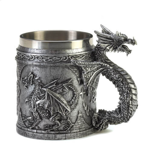 Silver-toned mug with scene of a dragon, and dragon handle. Stainless steel insert. Shown from one side with standing dragon on the outer part