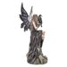 Side view of the fairy and raven figurine showing her hair and dress draping down