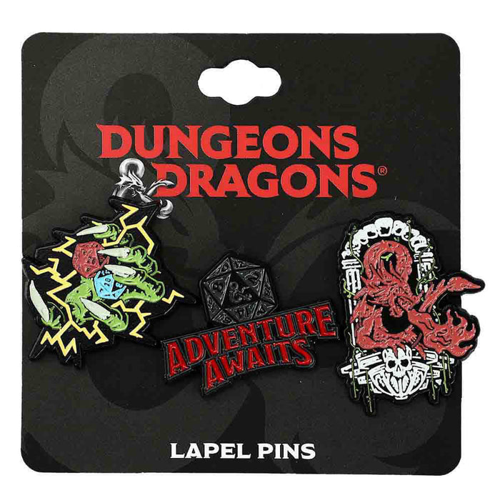 Set of three lapel pins themed for Dungeons & Dragons. One has the D&D logo in a spooky doorway. One has a clawed green hand holding out dice with magic lightning flickers. The last has a D20 dice in black with the text "Adventure Awaits". They are on a hang card with the D&D logo