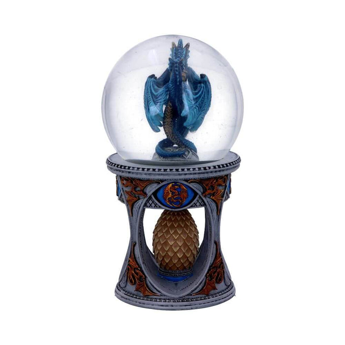 Waterglobe snowglobe with two blue dragons facing each other inside. Ornate base with golden dragon designs and a bronze dragon egg at the center Side view