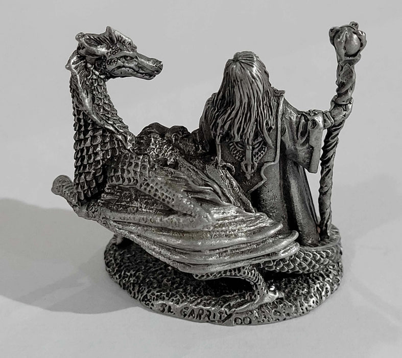 Pewter sorceress and dragon shown from the back
