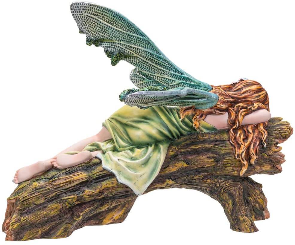 The statue features a lovely pixie sleeping on a forest log. The fae lady has a green dress and leafy emerald dragonfly wings to match. Her red-brown hair is adorned with colorful flower blossoms, and purple mushrooms sprout from the wood she slumbers on. Back view