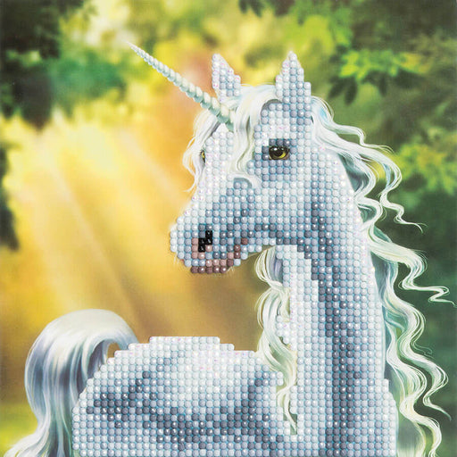 Sunshine Unicorn Crystal Art Card Kit makes this greeting card of a white unicorn standing in a sunlit forest!