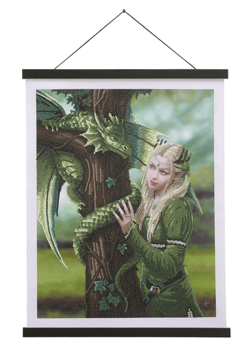 Finished crystal art scroll showing woman in green and dragon wrapped around tree, art by Anne Stokes
