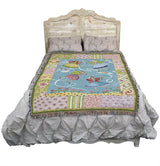 Fairy Princess tapestry blanket, shown on a bed