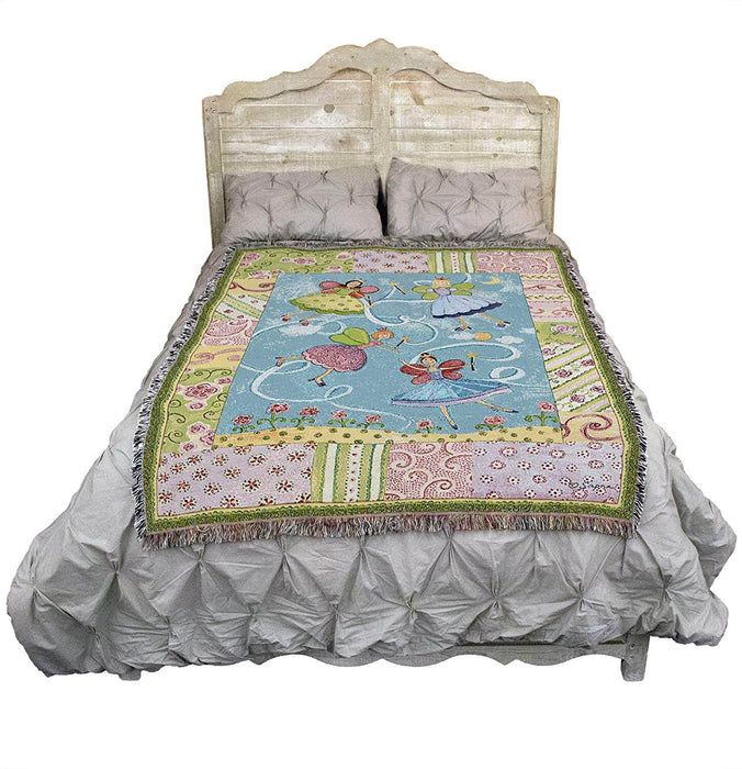 Fairy Princess tapestry blanket, shown on a bed