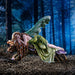 The statue features a lovely pixie sleeping on a forest log. The fae lady has a green dress and leafy emerald dragonfly wings to match. Her red-brown hair is adorned with colorful flower blossoms, and purple mushrooms sprout from the wood she slumbers on. Image shows the piece set with a dark forest background