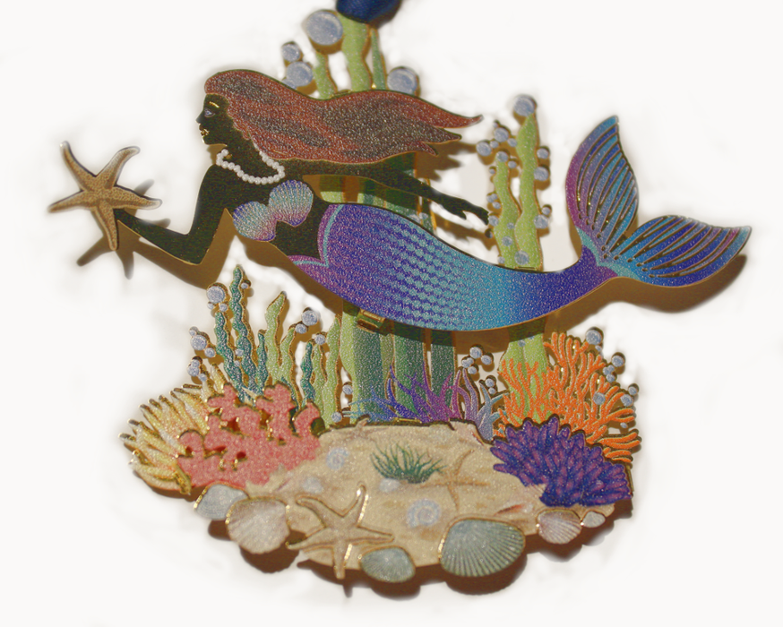 Brass mermaid ornament with colorful siren in a seascape