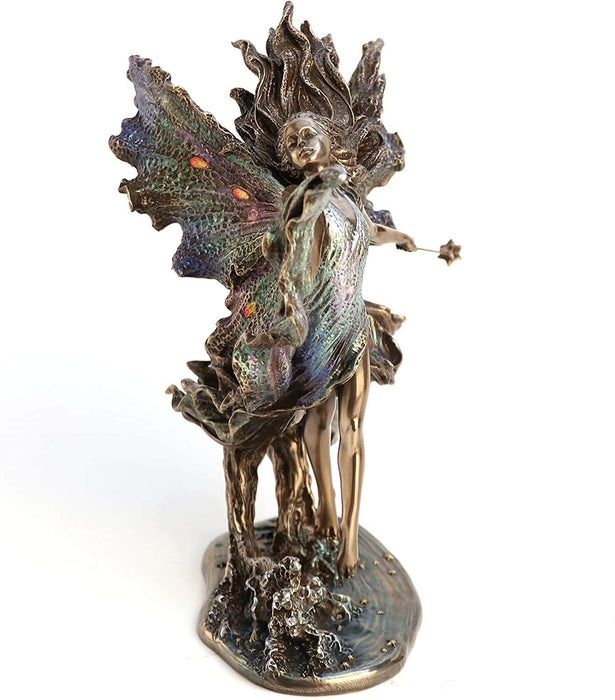 Fairy with subtle rainbow wings and wand outstretched. Front view