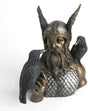 Norse god Odin with ravens Huginn and Muninn. Wearing armor, winged helmet and eye patch with braided beard, in metal colors