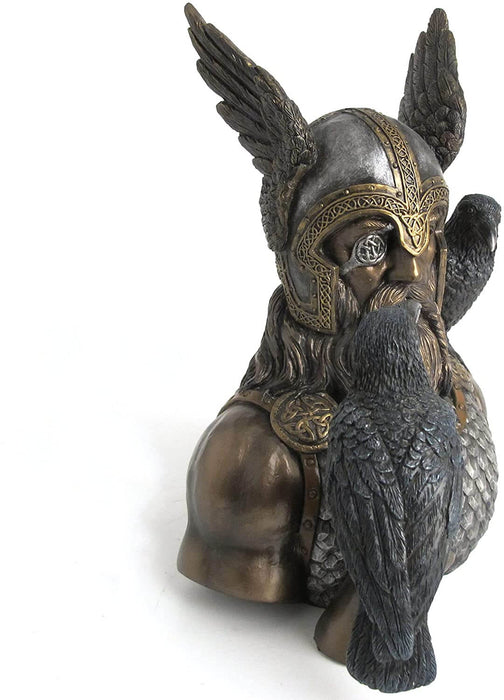 Norse god Odin with ravens Huginn and Muninn. Wearing armor, winged helmet and eye patch with braided beard, in metal colors. Side view of bust