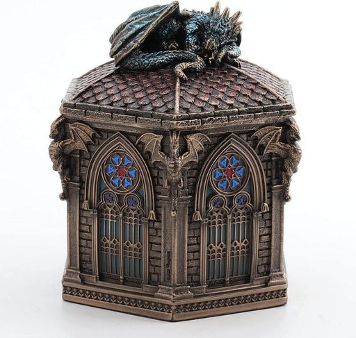 Trinket box shaped like a cathedral with faux windows and dragon gargoyles. The lid is the roof, with a resting dragon on top