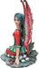 Fairy Figurine in red and green with holly leaves and berries, by artist Amy Brown. Side view. 