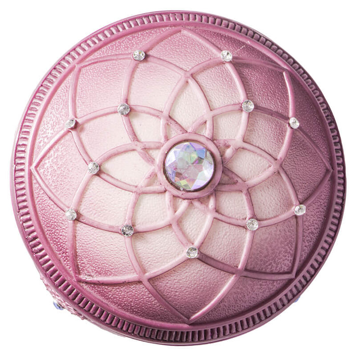 Pink-purple dreamcatcher themed trinket box accented with jewels. Top down view showing the lid with its large gem in the center and smaller jewels around